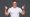 Happy fit sporty older man coach, middle aged personal trainer wearing white t-shirt showing like thumbs up standing isolated on gray background motivating for good results giving recommendation.